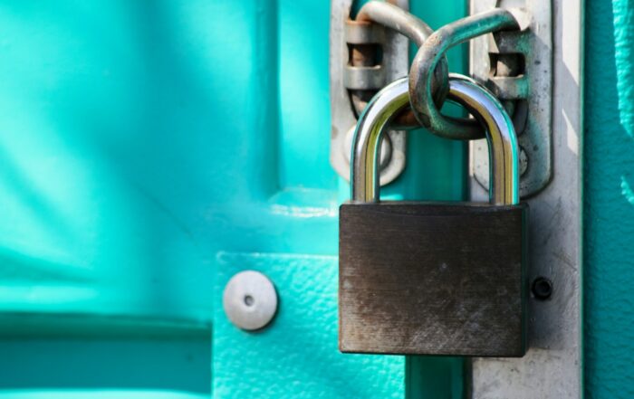 a close up of a padlock on a door